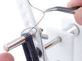 Grabbing the material with tweezers